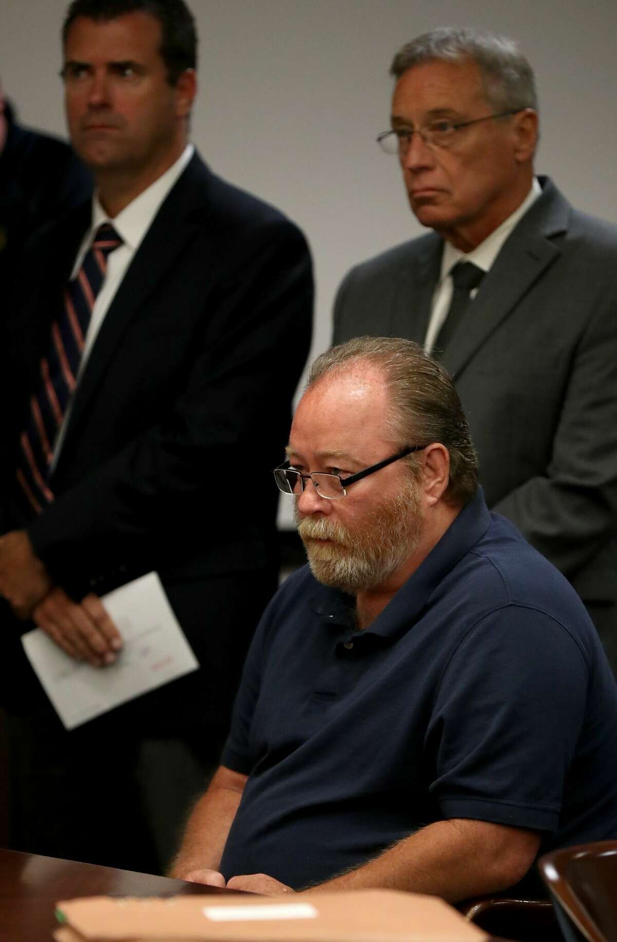 William Reece sits in 405th District Court Judge Jared Robinson’s courtroom in Galveston, Texas on Wednesday, June 29, 2022, after pleading guilty to two felony murder charges for the deaths of Laura Kate Smither and Jessica Cain in 1997. 