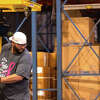 Dot Foods employee Winiban Irigoyen of Beardstown competes during the Forklift Rodeo National Competition at Dot Foods.