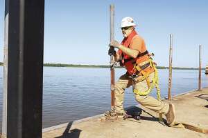 Riverfront fence removed in Alton