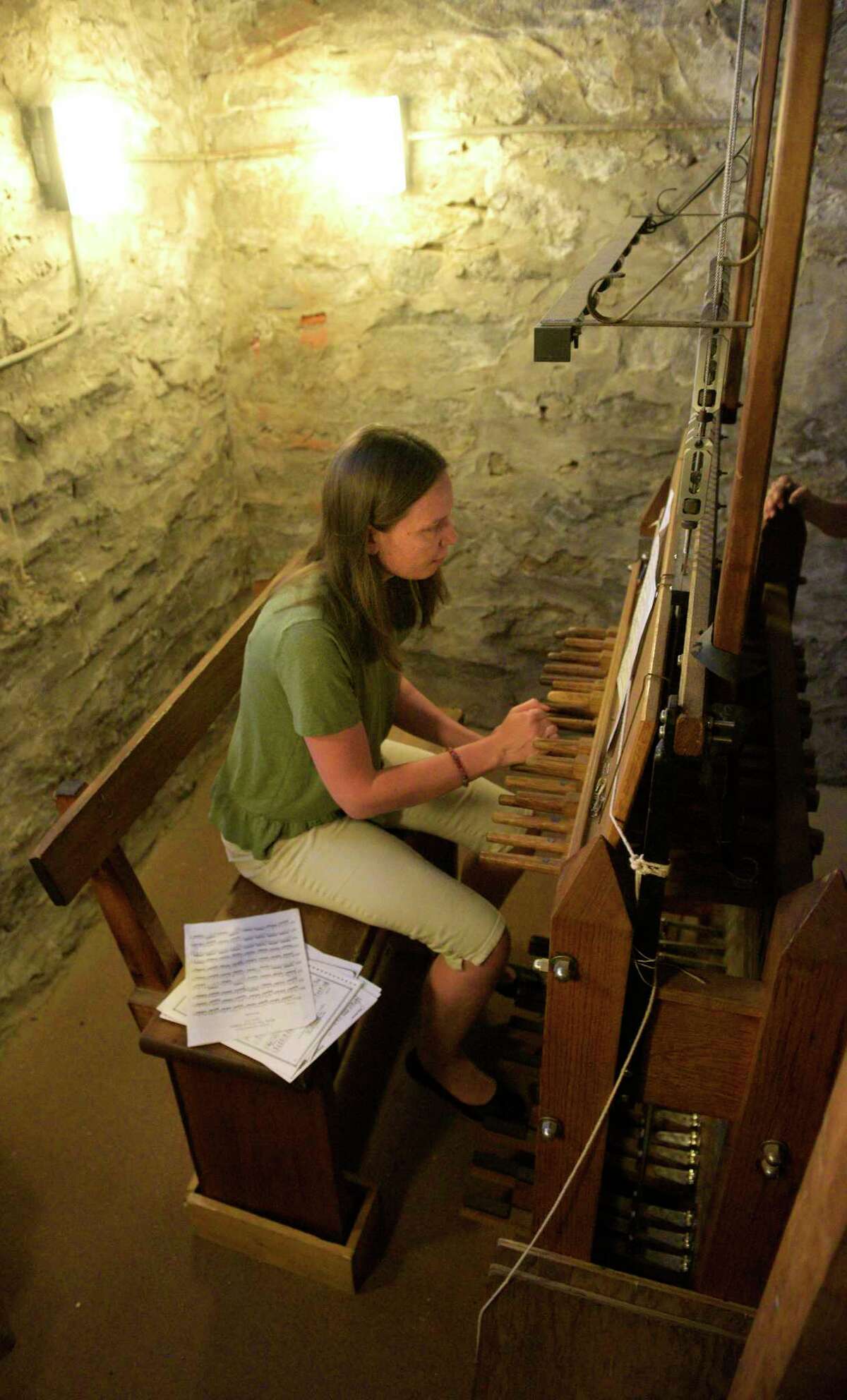 Tatiana Lukyanova practices on the bell tower carillon at St. James's Episcopal Church ahead of the church's first summer carillon concerts on Wednesday, June 29, 2022. Lukyanova, from New Britain, is organist and accompanist at South United Methodist Church, Manchester, carillonneur at the First Church of Christ Congregational in New Britain and carillonneur in residence at Storrs Congregational Church.  Danbury, Conn.