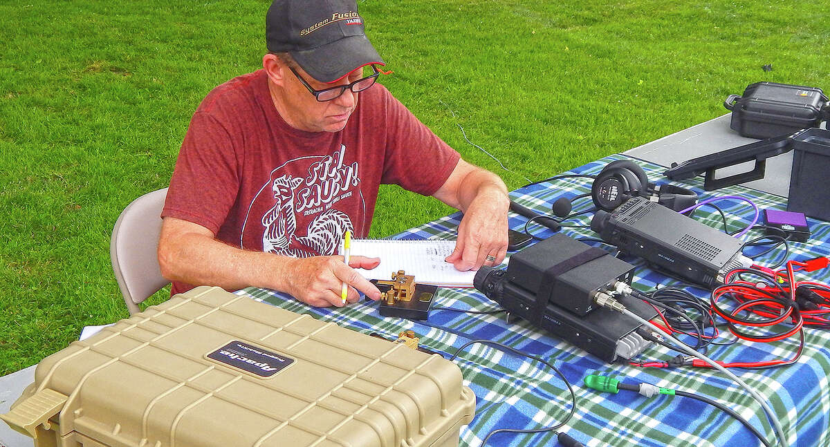 Mike Mayberry of the Jacksonville Amateur Radio Society uses Morse code to communicate with other ham radio operators around the world. The West Central Illinois Hamfest will be from 7 a.m. to noon Saturday at the Macoupin County Fairgrounds in Carlinville.