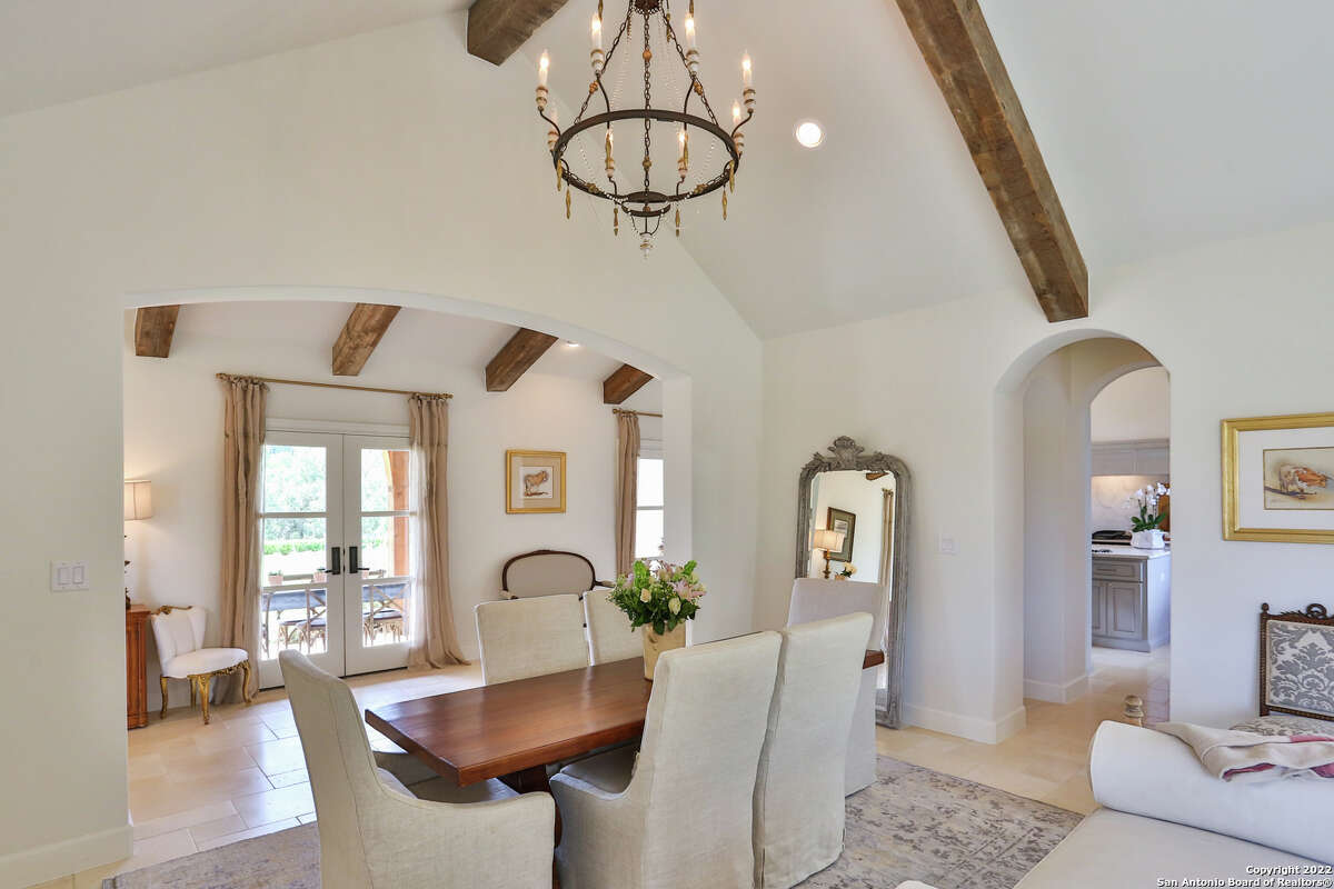 The 3,607-square-foot Boerne home with a stone chimney and walls surrounding the front side and side courtyard sits on 1.2 acres just southwest of downtown Boerne.