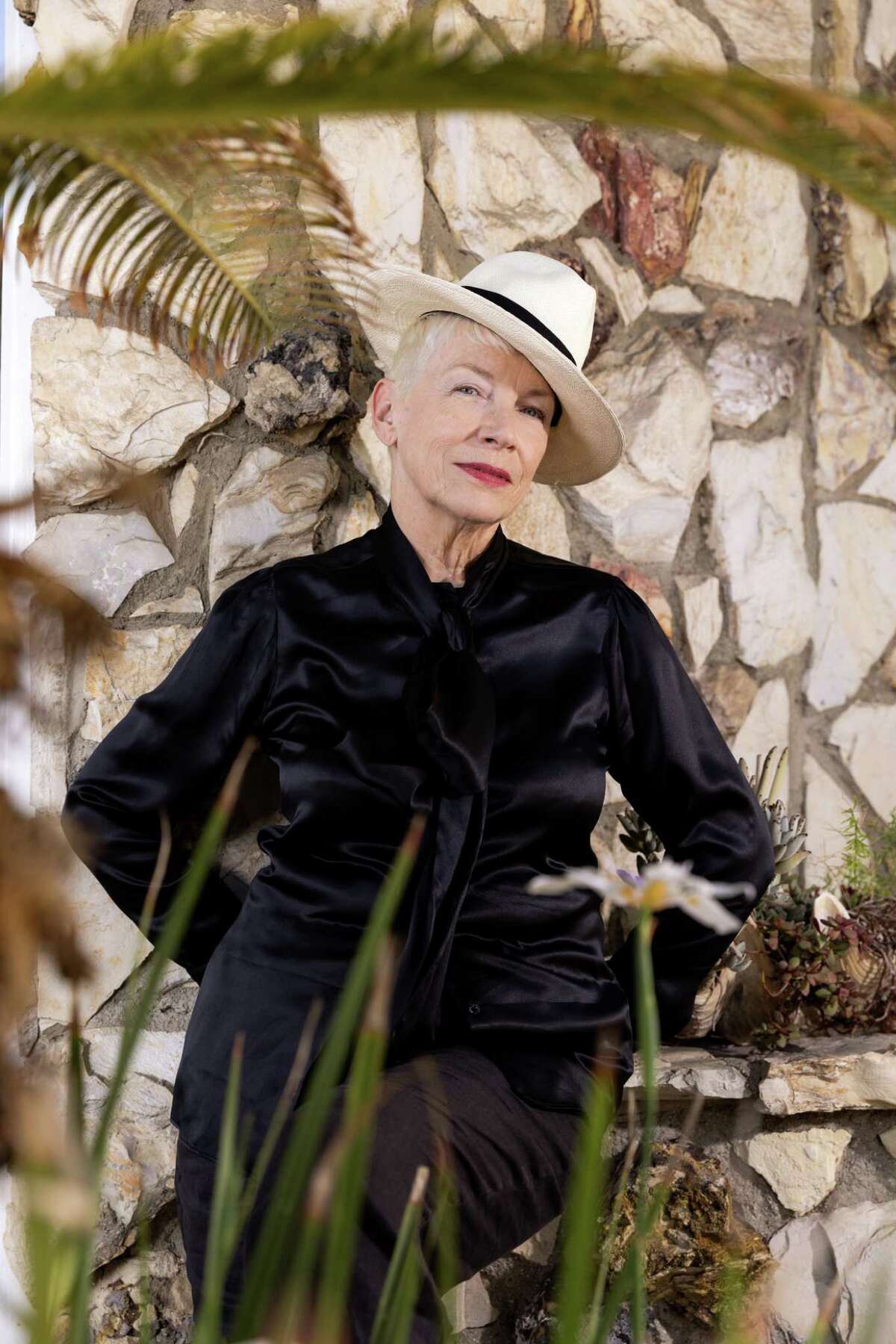 Singer Annie Lennox, 67, poses at home in Los Angeles. The onetime half of the duo Eurythmics, which had an almost decade-long run up the pop charts, became a comforting, auntie-like presence on Instagram during the pandemic.