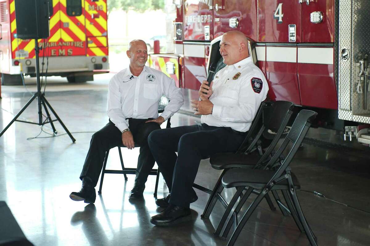New Pearland Fire Chief Jack “J” Taylor III introduces himself during the Talk of the Town meeting as he sits with Mayor Kevin Cole at the new Fire Station No. 4.