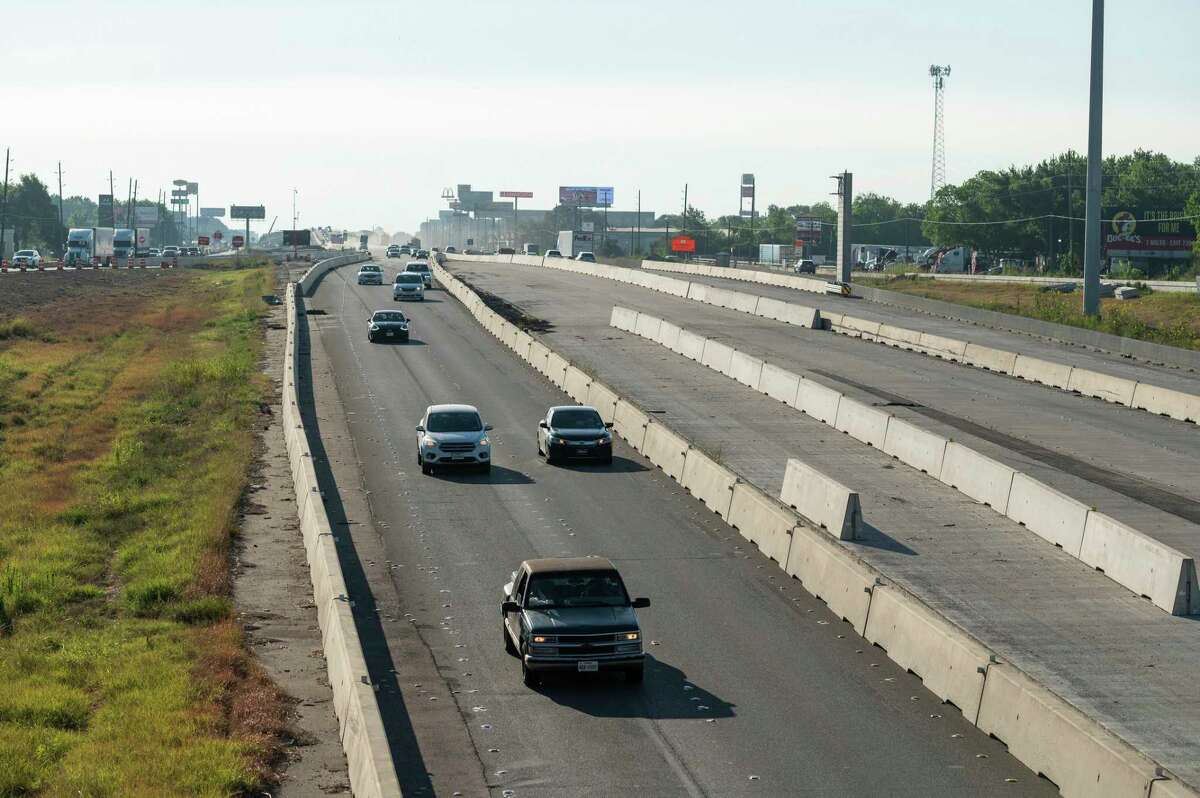 Drivers travel along Interstate 10 east of the Koomey Road bridge June 30, 2022, in Brookshire. The Texas Department of Transportation is still widening I-10 west of Brookshire to three lanes in each direction.