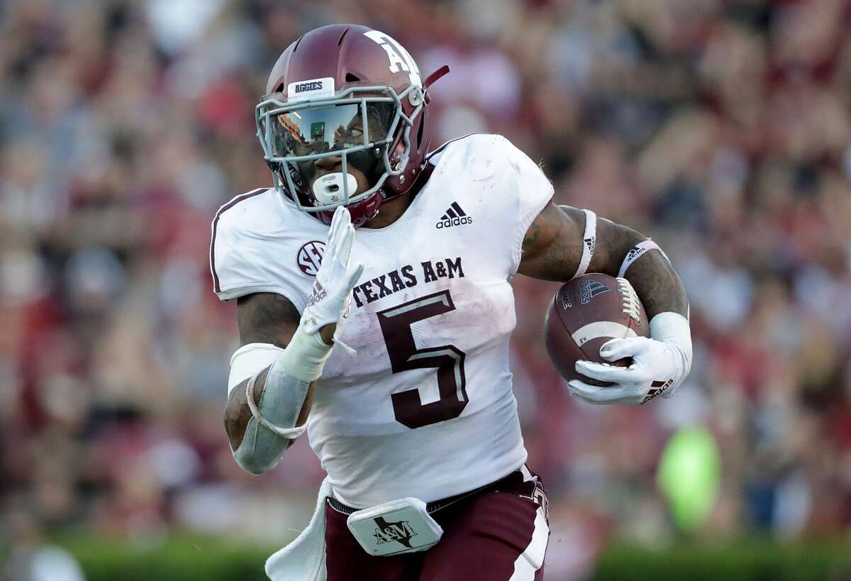 Trayveon Williams (5) of the Texas A&M Aggies runs with the ball against the South Carolina Gamecocks during their game at Williams-Brice Stadium on October 13, 2018 in Columbia, South Carolina.