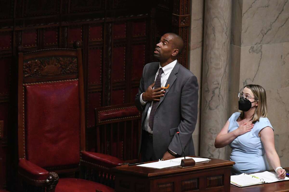 Lt. Gov. Antonio Delgado recites the Pledge of Allegiance to begin a special session in the Senate to debate legislation crafted in response to recent U.S. Supreme Court rulings that have returned the issue of abortion rights to states and allowed lawful gun owners to carry their weapons on Thursday, June 30, 2022, at the Capitol in Albany, N.Y.