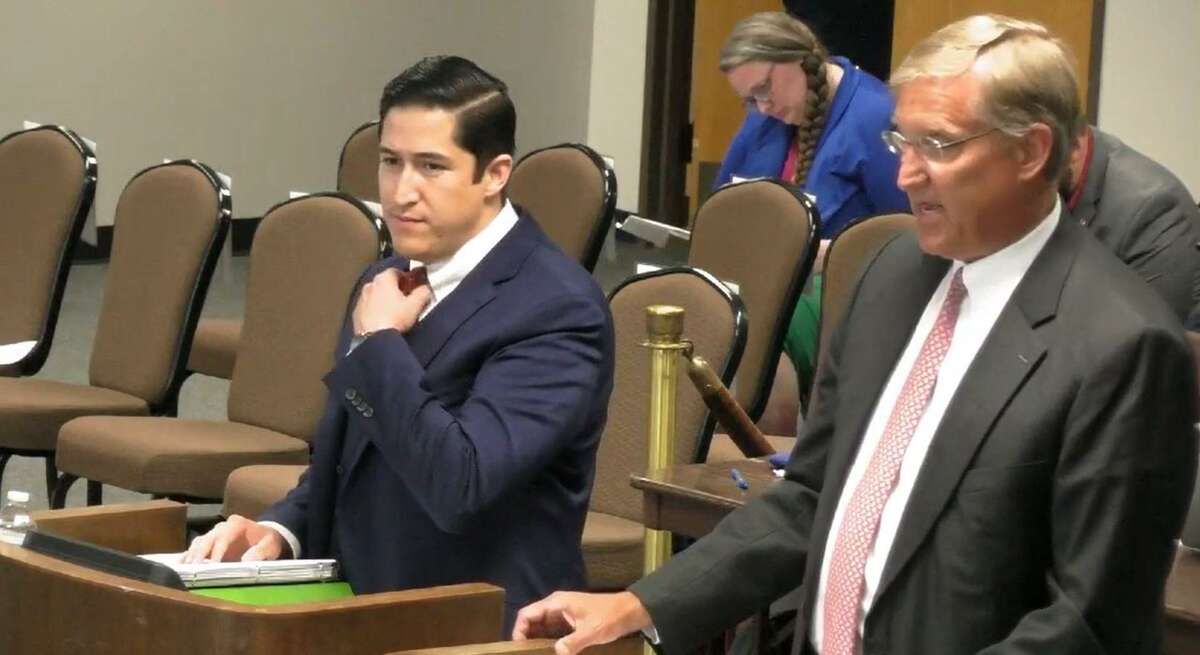 Stuart Saunders, president of the Heritage Classical Academy board (right), and the academy’s Superintendent Oscar Ortiz pitch the Hertiage Charter School to members of the Texas State Board of Education in June 2022.