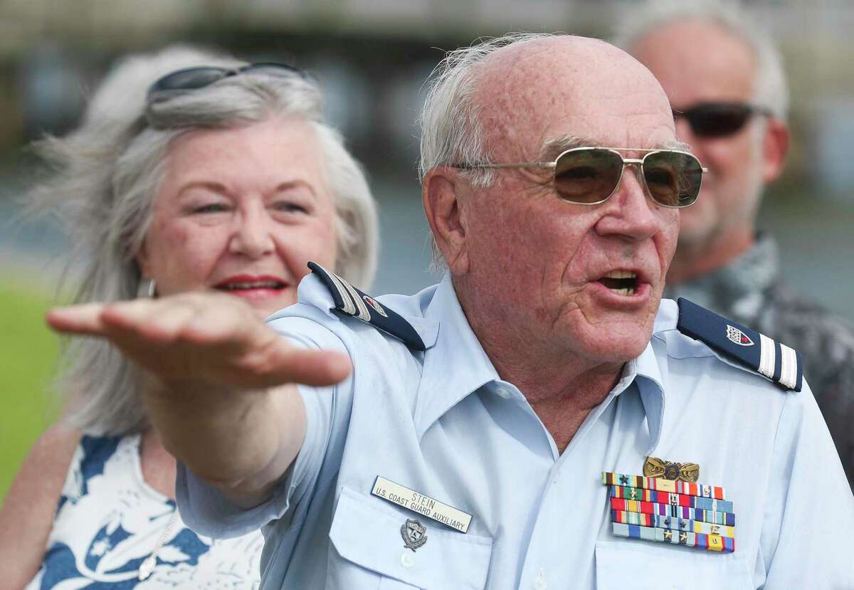Richard Stein, 75, tells a story from his 20-years serving on the United States Coast Guard Auxiliary on Lake Conroe during a ceremony honoring him, Thursday, June 30, 2022, in Conroe.