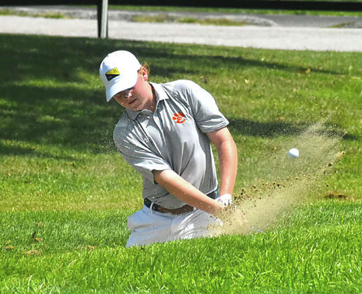Edwardsville's Mason Lewis hits out of the bunker during the Madison County Tournament at Belk Park in Wood River last season. Lewis is the 2021 Telegraph Boys Golfer of the Year.