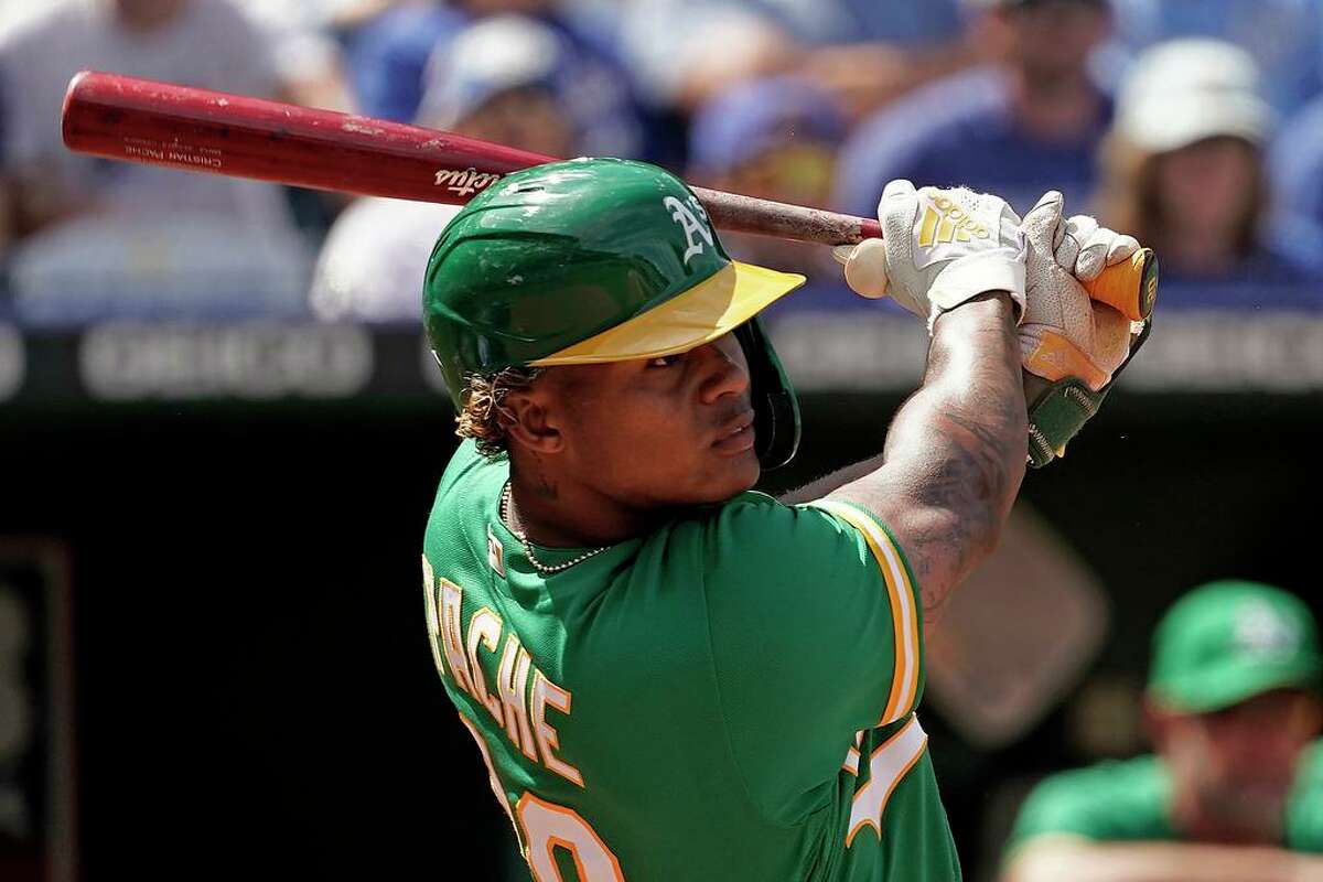 The A's Cristian Pache hits an RBI single during the ninth inning against the Kansas City Royals on Sunday, June 26, 2022, in Kansas City, Mo. The Athletics won 5-3.
