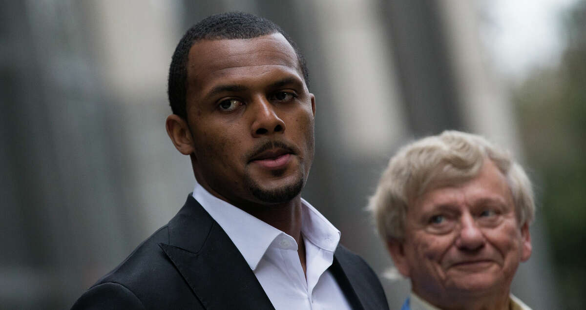 Texans quarterback Deshaun Watson talks to reporters after a Harris County grand jury declined to indict him and chose not to criminally charge him in nine alleged instances of sexual assault or harassment during various private massage appointments, on Friday, March 11, 2022, in Houston. The decision came down the same day Watson was deposed in connection with two of the 22 civil lawsuits against him.