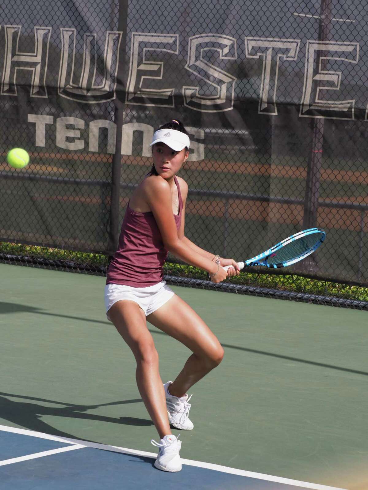 Katy resident Ally Lin competes during the USTA Texas Slam. Lin won six consecutive matches to claim the 18-and-under girls singles championship.