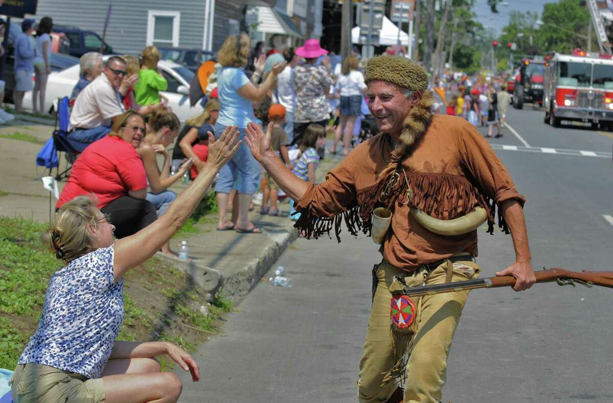 A marcher dressed as Daniel Boone in a parade in Schuylerville, N.Y., in 2010.