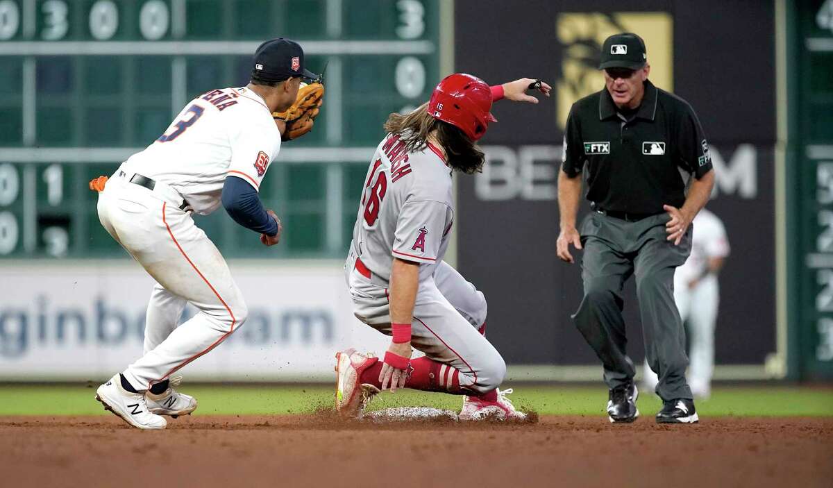 Houston Astros shortstop Jeremy Pena (3) catches Los Angeles Angels Brandon Marsh (16) stealing second base during the fifth inning of an MLB baseball game at Minute Maid Park on Tuesday, April 19, 2022 in Houston.