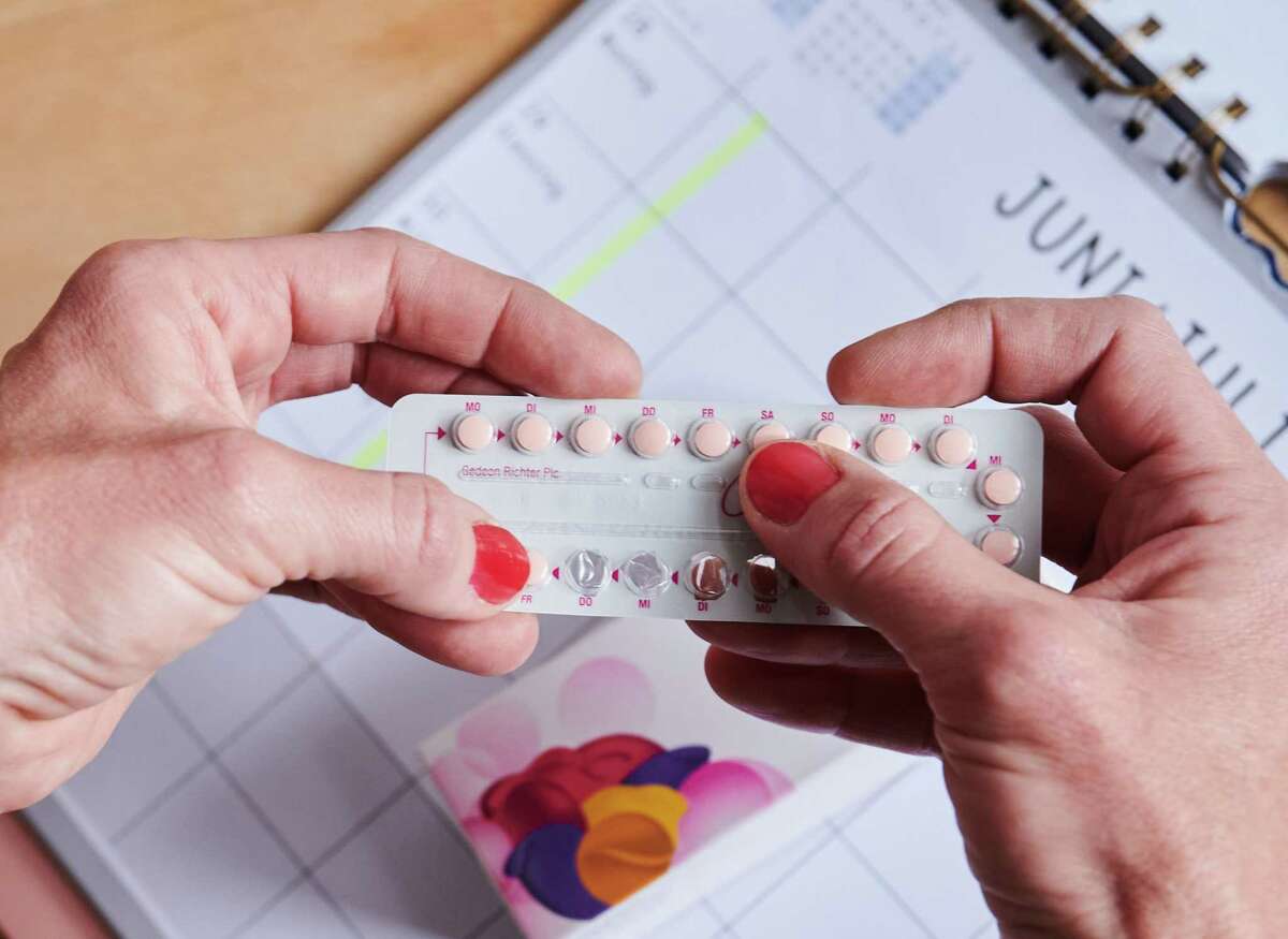 A woman holds a monthly pack of the contraceptive pill in Berlin, Germany on May 25, 2021. The birth control pill went on sale in Germany 60 years earlier. Bay Area telemedicine companies are reporting increased demand for emergency contraception since the Supreme Court overturned Roe v. Wade on June 24, 2022.