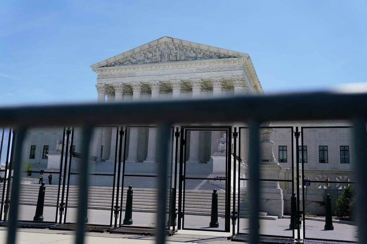 A fenced offf U.S. Supreme Court last month. In rulings on guns, abortion and religious education, the court’s majority showed inconsistency to support its own political leanings. Other rights are clearly within its sights.