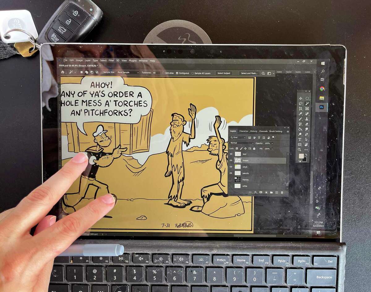 Randy Milholland shows how he uses a touch pad to create his Sunday Popeye comics.