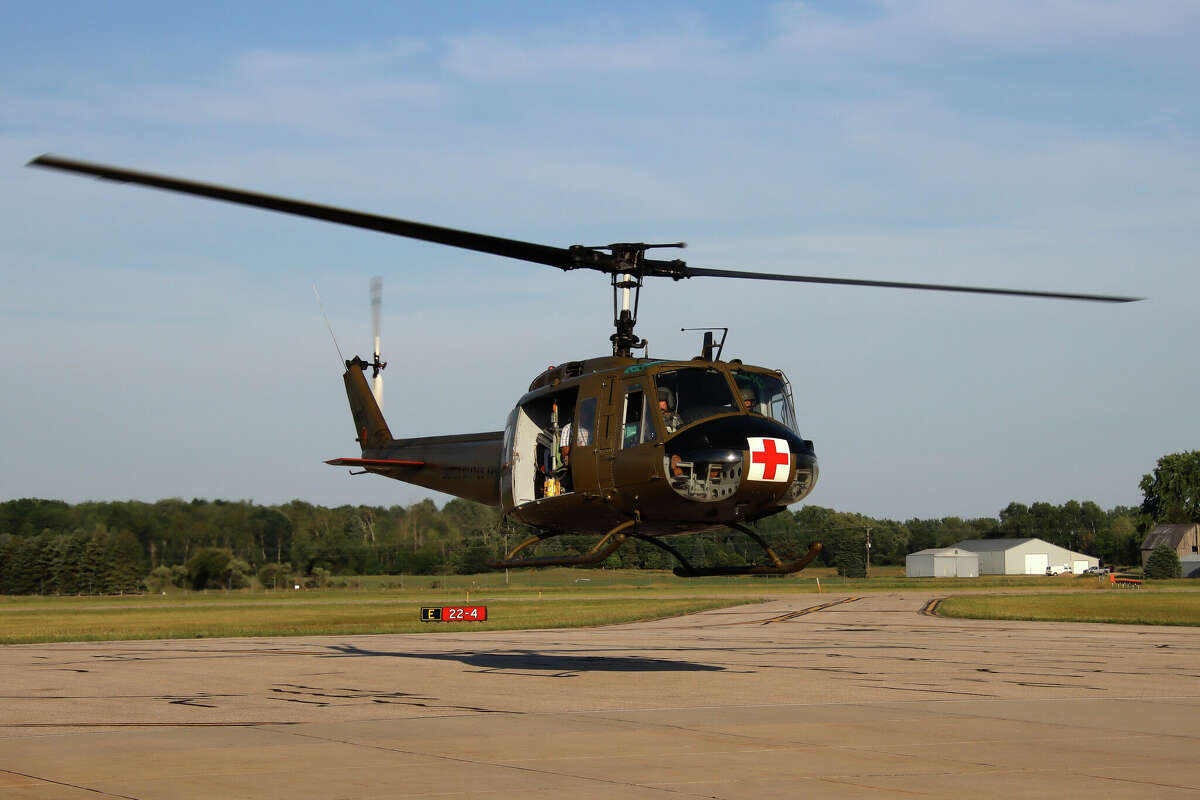 A Vietnam-era Huey helicopter landed at the Huron County Memorial Airport Thursday evening for an overnight stay on its way to the Cass City Freedom Festival.