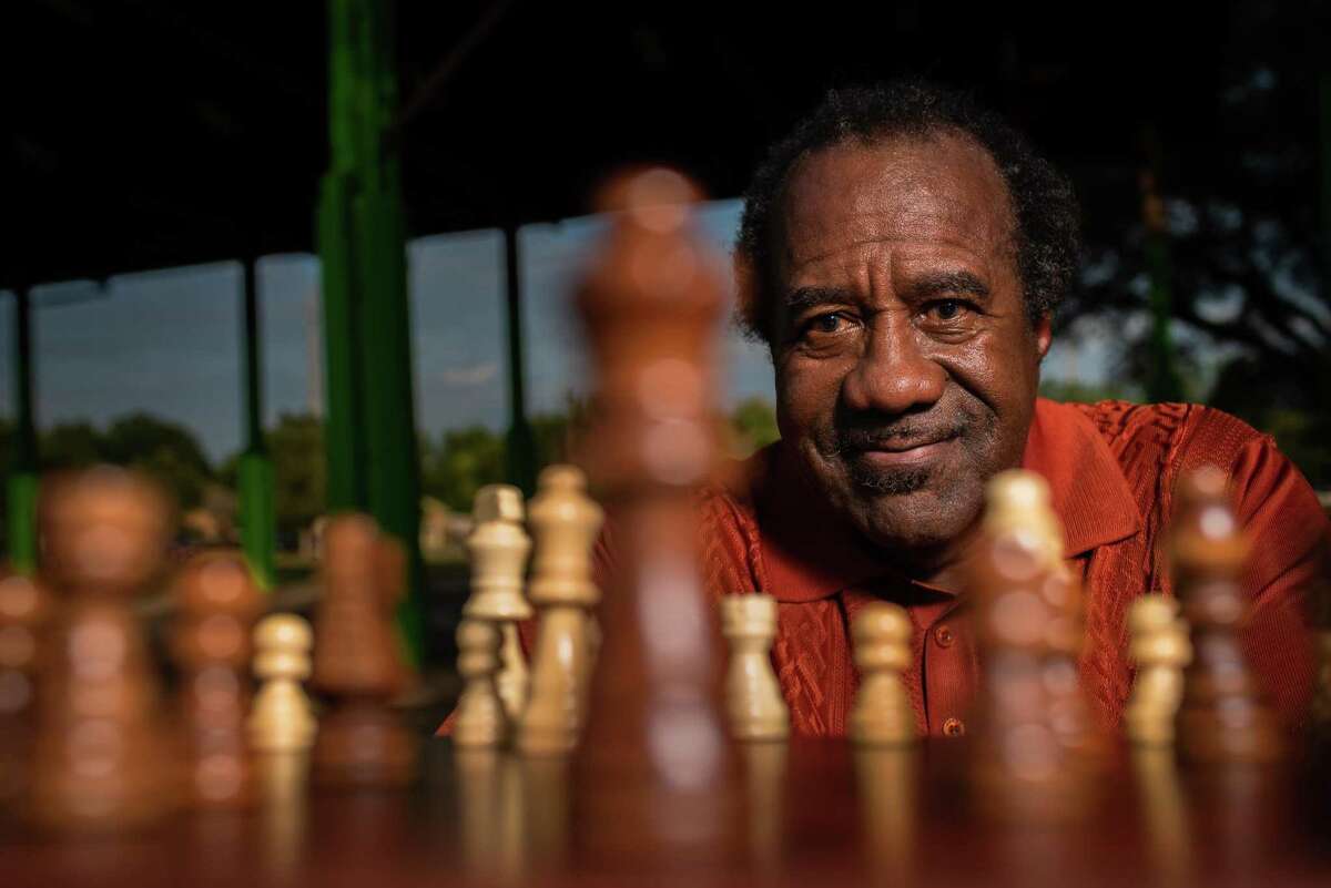Chess champ Rodney Griffin sits for a portrait with a chess set at Sunnyside Park, Tuesday, June 28, 2022, in Houston. Sixty years ago, the Worthing High School chess team made history by finishing in the "Winner's Circle" after desegregating the Houston High School Chess League.