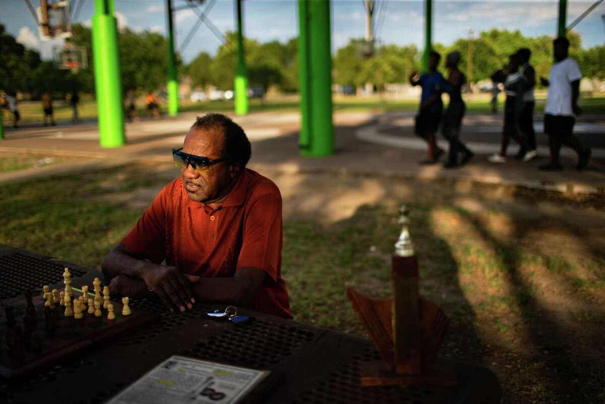 Chess champ Rodney Griffin sits for a portrait with a chess set at Sunnyside Park, Tuesday, June 28, 2022, in Houston. Sixty years ago, the Worthing High School chess team made history by finishing in the "Winner's Circle" after desegregating the Houston’s High School Chess League.