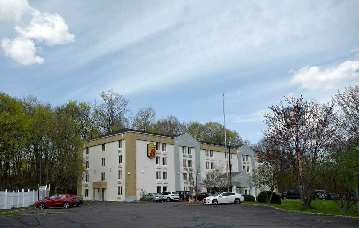 Danbury’s temporary homeless shelter at the former Super 8 motel on Lake Avenue Extension, in Danbury, Conn.. Wednesday, April 14, 2021. The building may become affordable housing for up to 66 homeless people under an agreement in principle that is subject to state and local approvals.