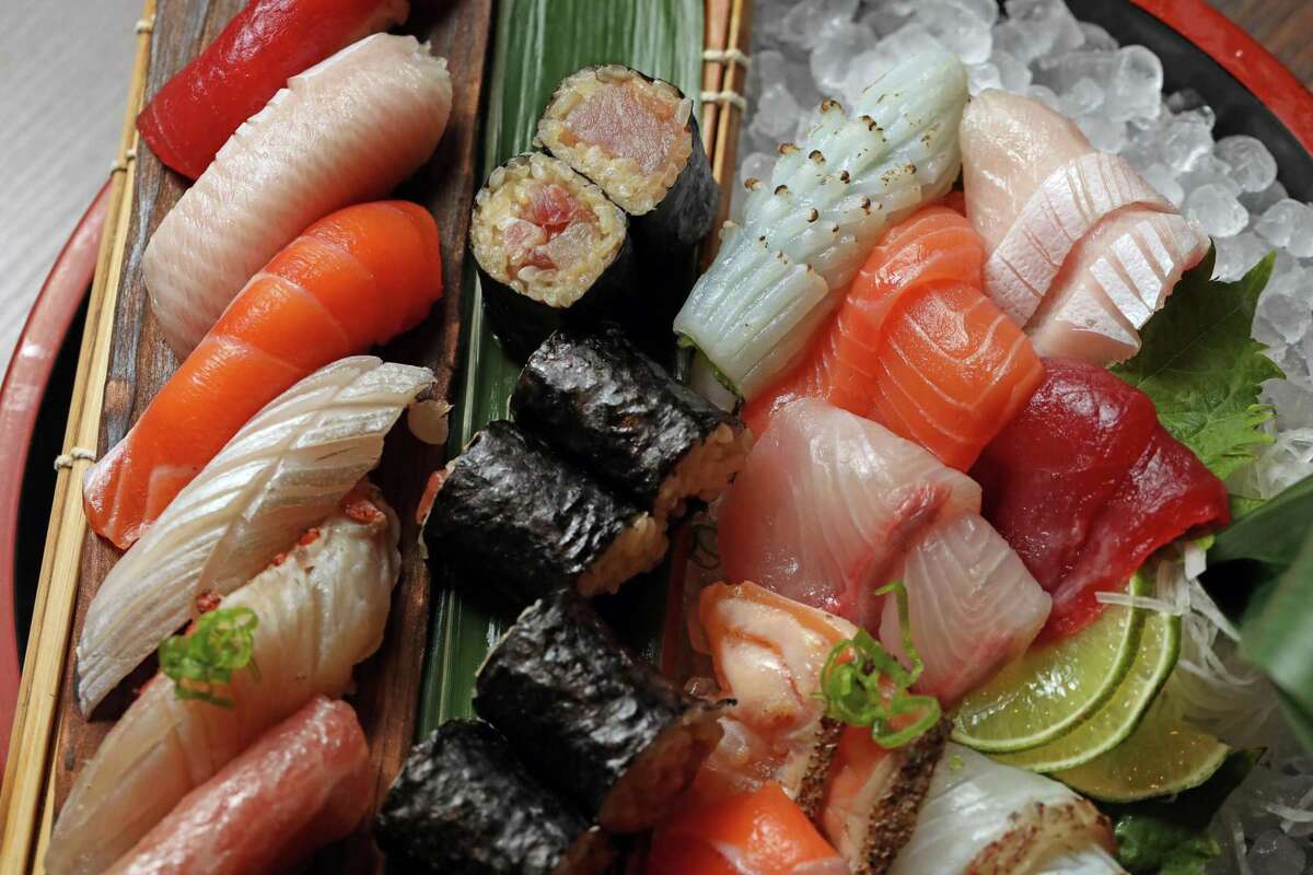 Nigiri and sashimi sets are rolled out for dinner parties at Mujiri in Oakland.