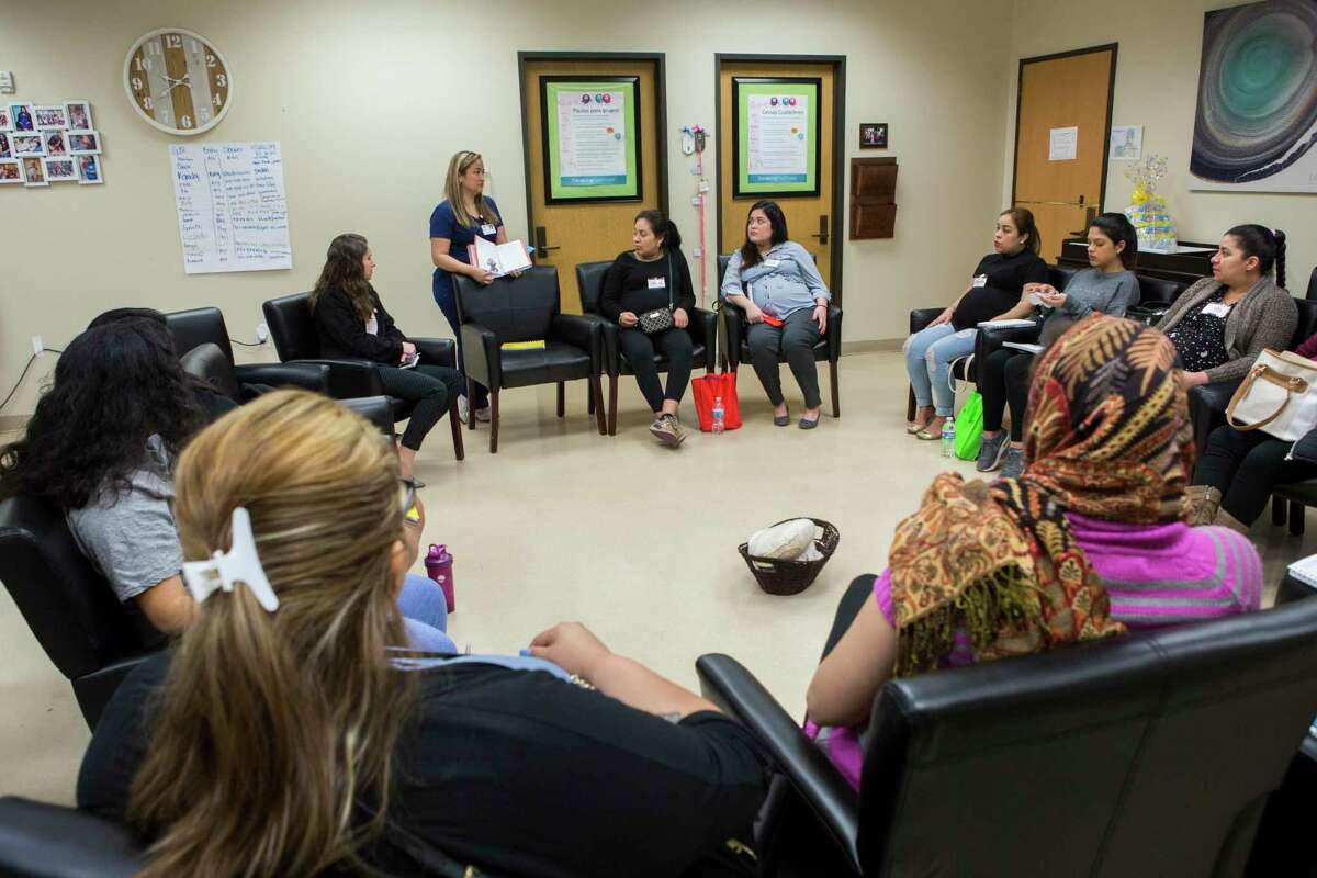 Pregnant women gather for a Centering Pregnancy session on which a group of women due at the same time learn about their pregnancy in a comfortable group setting at El Centro de Corazón on Tuesday, Feb. 12, 2019, in Houston.