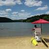 Lifeguard Ian Chen keeps an eye on swimmers at Candlewood Town Park on Wednesday, June 29, 2022, Danbury, Conn.