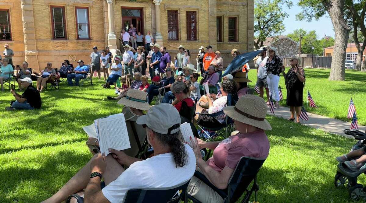 People read books that have been banned while Llano County officials read the Declaration of Independence at a celebration.