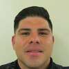 Deputy Ernesto Garza, 32, was arrested early Friday and charged with driving while intoxicated and evading arrest.