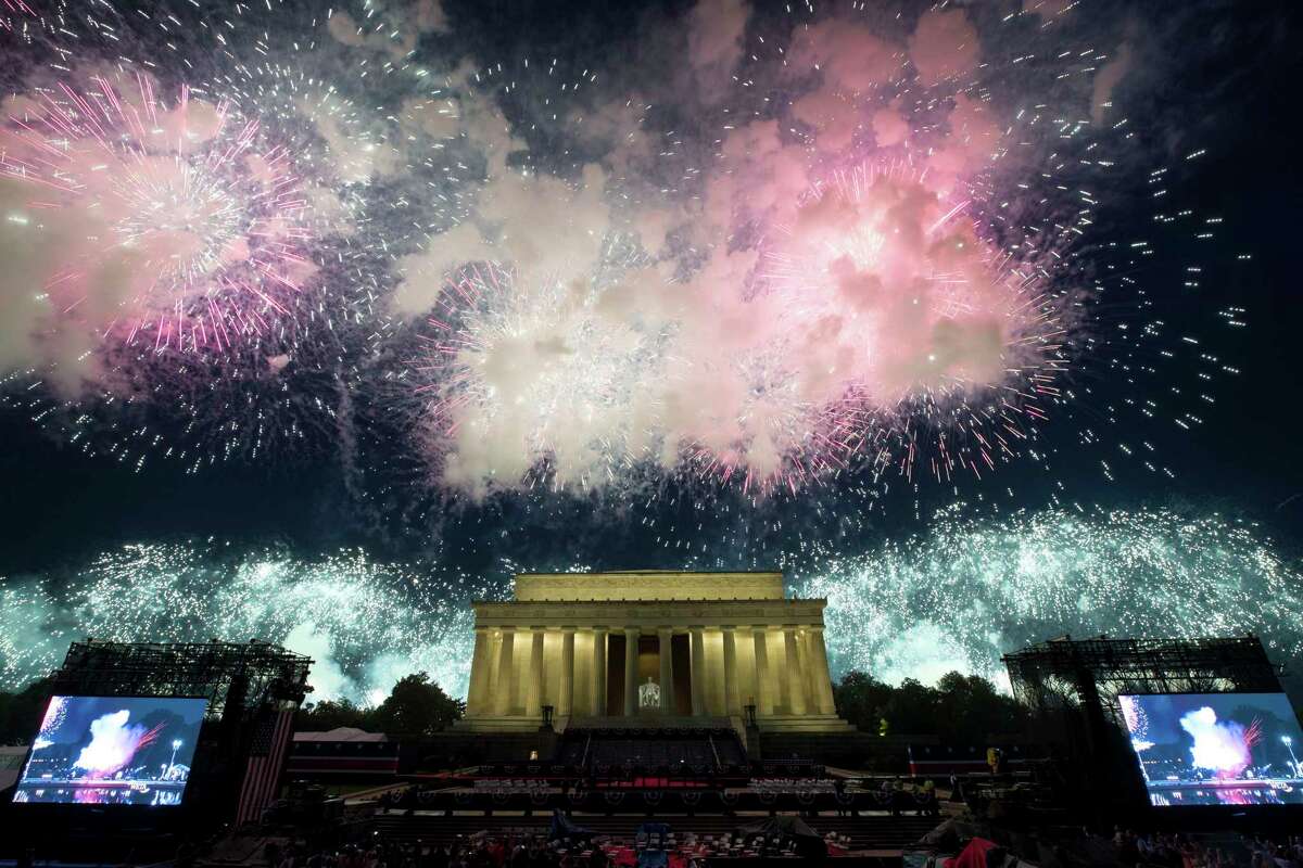Fireworks light the sky near the Lincoln Memorial in 2019. On Independence Day, we celebrate our ideals while we acknowledge the challenge to fulfill them.