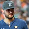 Houston Astros pitcher Lance McCullers walks onto the field to catch a ceremonial first pitch from his father before a game between the Houston Astros and Chicago White Sox on Sunday, June 19, 2022, at Minute Maid Park in Houston.