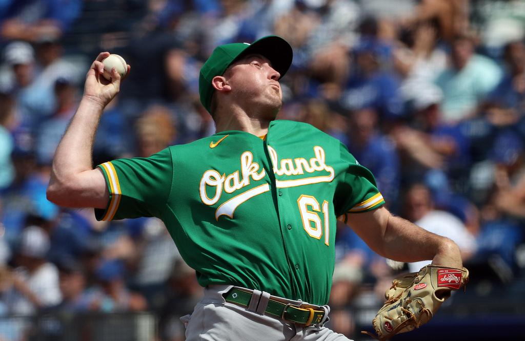 Oakland Athletics relief pitcher Zach Jackson throws to the Texas