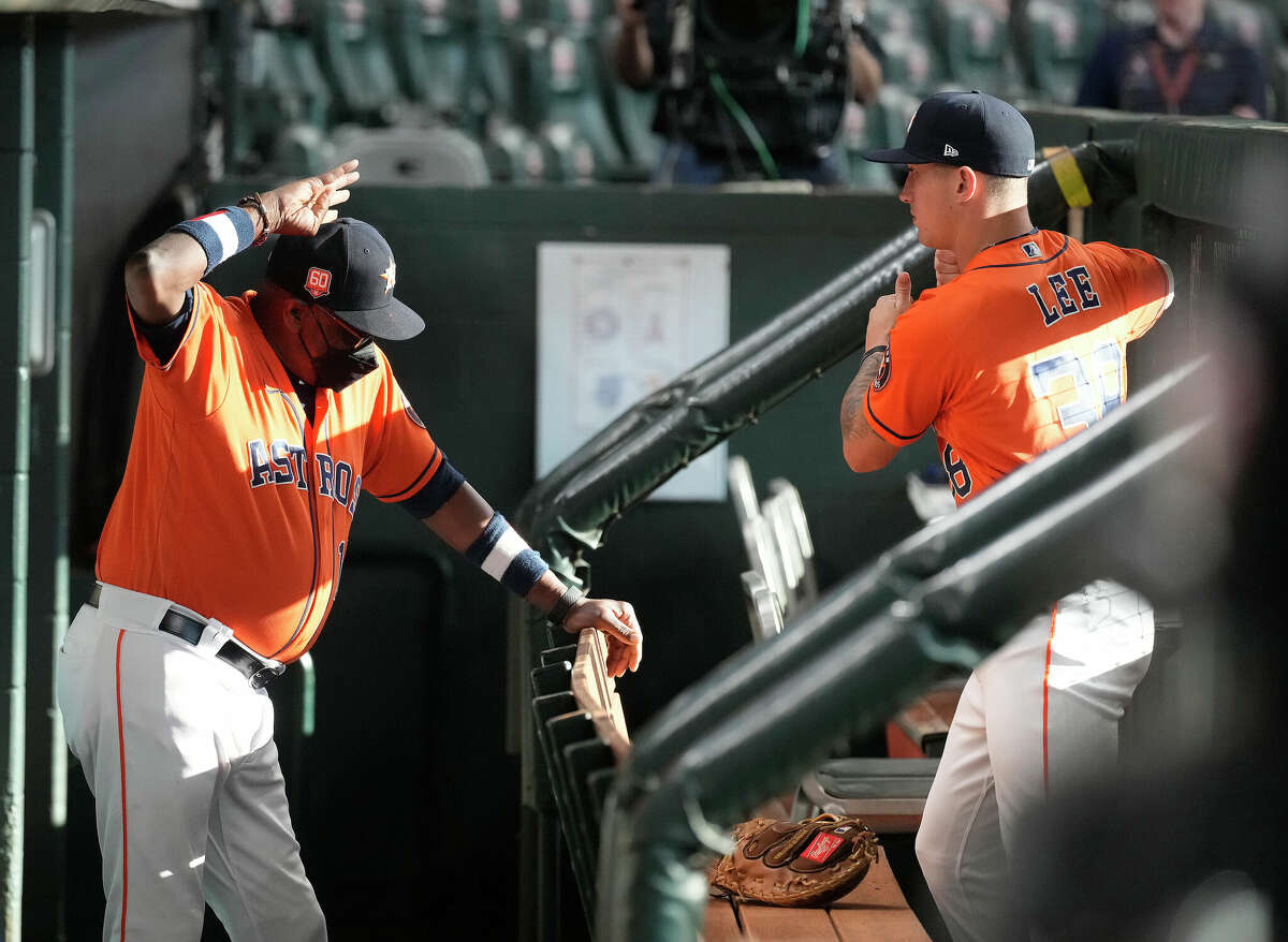 Houston Astros catcher Korey Lee (38) in the dugout with manager Dusty Baker Jr. (12) before the start of an MLB game at Minute Maid Park on Friday, July 1, 2022 in Houston.