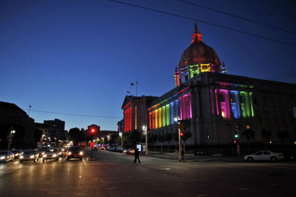San Francisco City Hall is awash in rainbow-colored lights on June 27, 2013, to celebrate the Supreme Court decision legalizing same-sex marriages.
