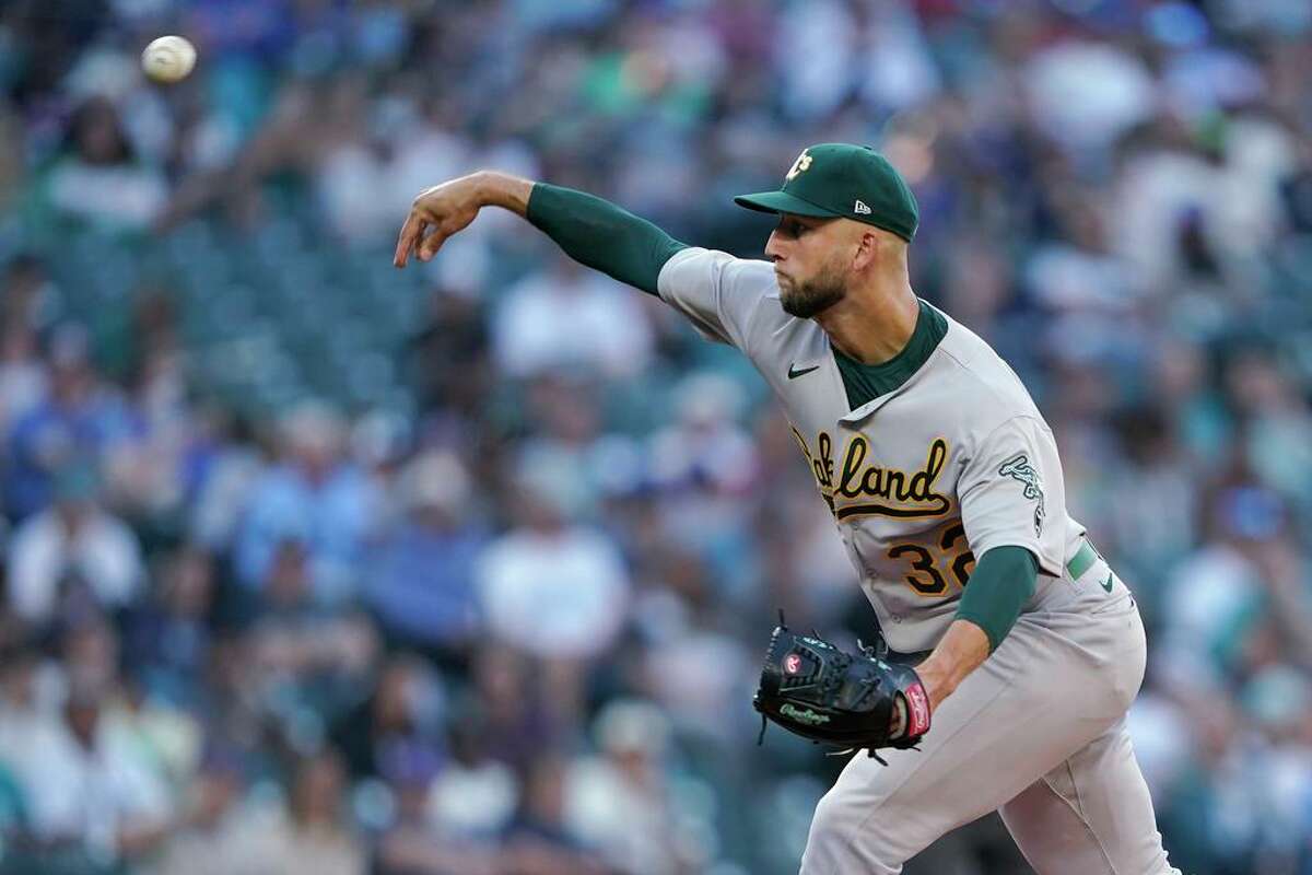 James Kaprielian of the Oakland Athletics pitches during the first