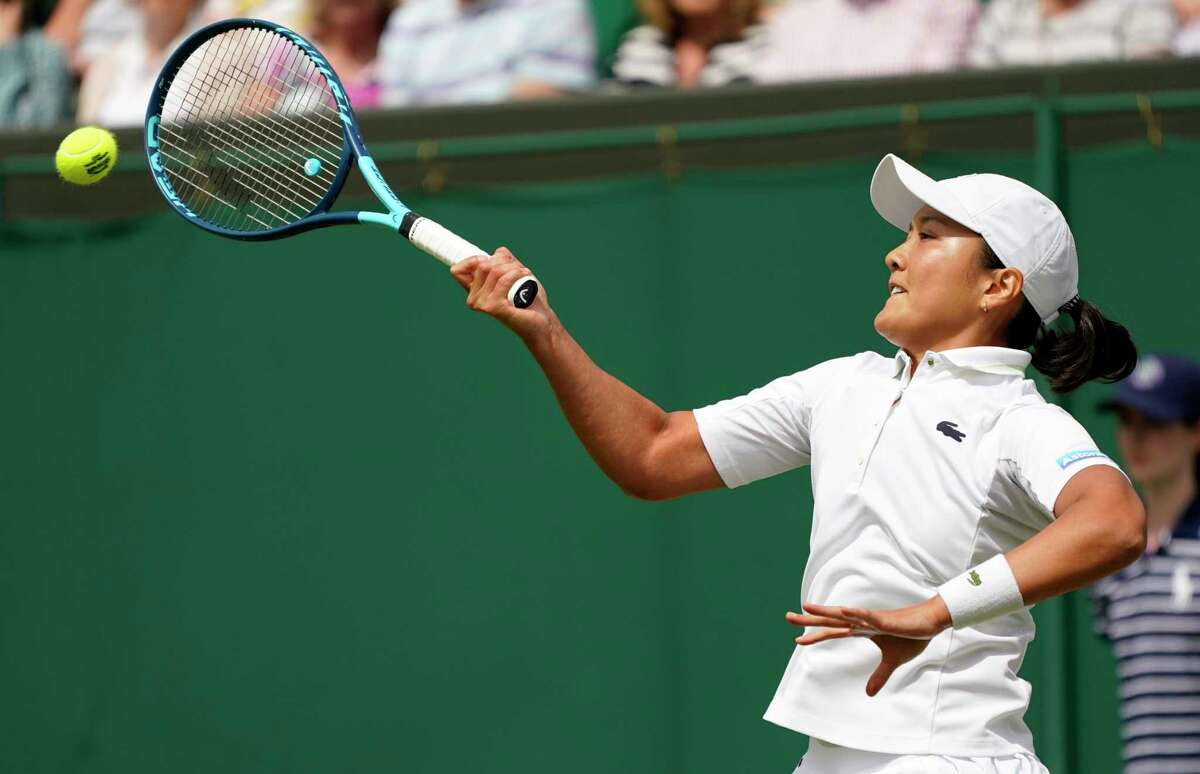France's Harmony Tan returns to Britain's Katie Boulter during their women's third round singles match on day six of the Wimbledon tennis championships in London, Saturday, July 2, 2022.