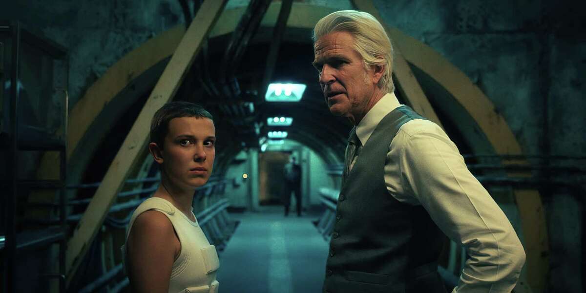 Millie Bobby Brown as Eleven and Matthew Modine as Dr. Brenner in Netflix's "Stranger Things."
