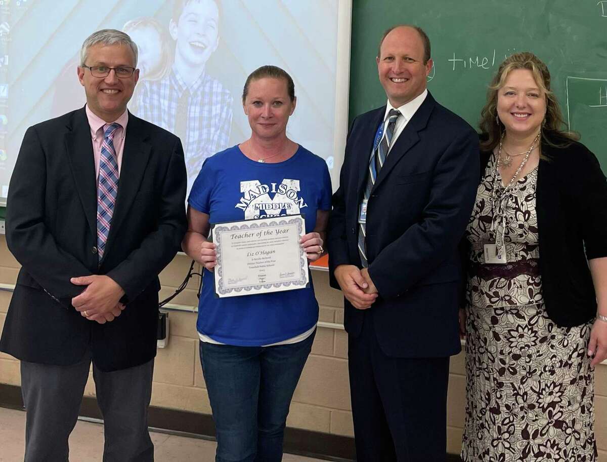 Trumbull Public School Teacher of the Year 2023 Elizabeth “Liz” O’Hagan (second from left) with Madison Principal Peter Sullivan, Superintendent Marty Semmel, and Assistant Superintendent Susan Iwanicki. O’Hagan was presented with district recognition June 10 2022.
