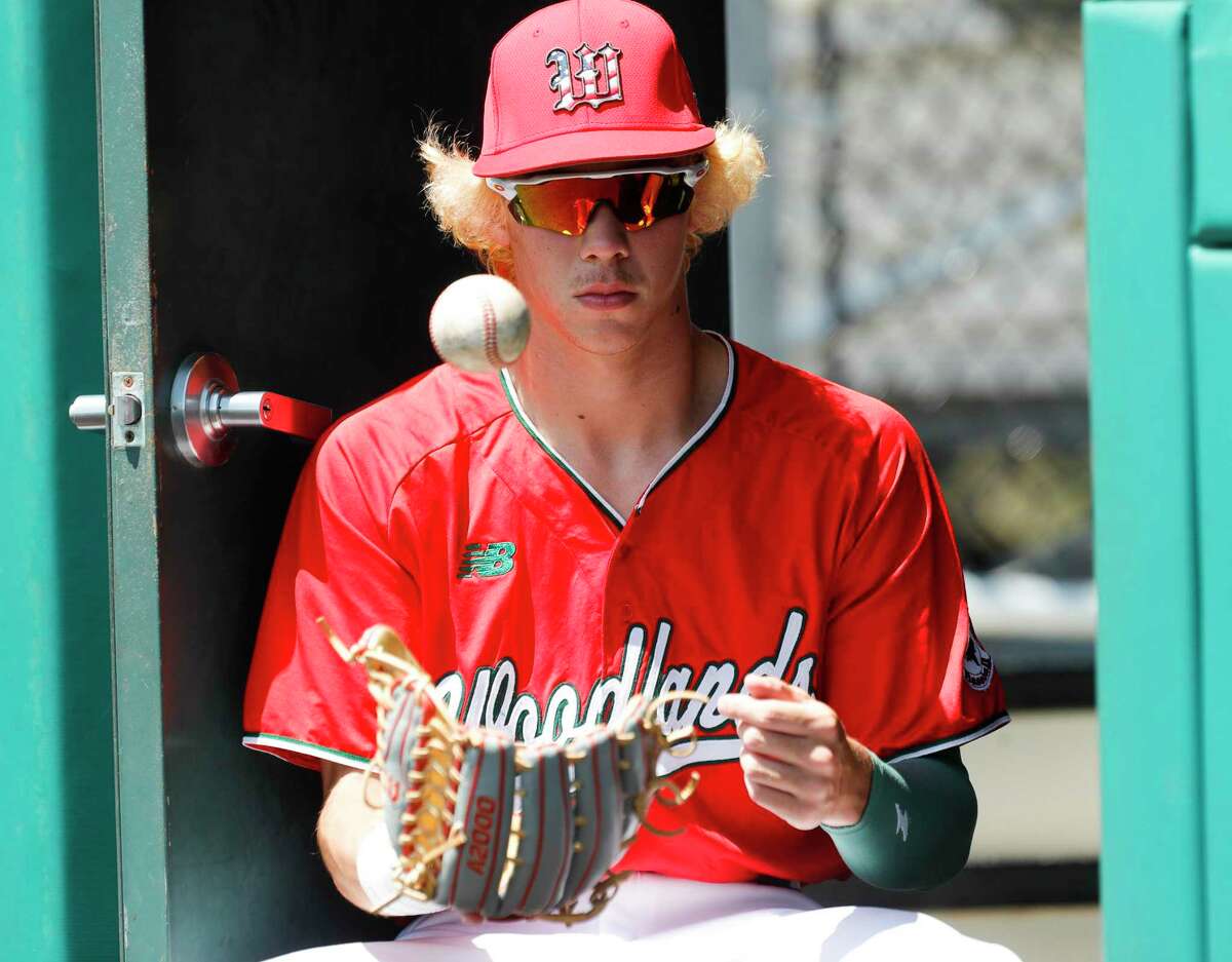 The Woodlands center fielder Brayden Sharp (21) is seen before Game 3 of a Region II-6A semifinal high school baseball playoff series at Concordia University, Saturday, May 28, 2022, in Austin.