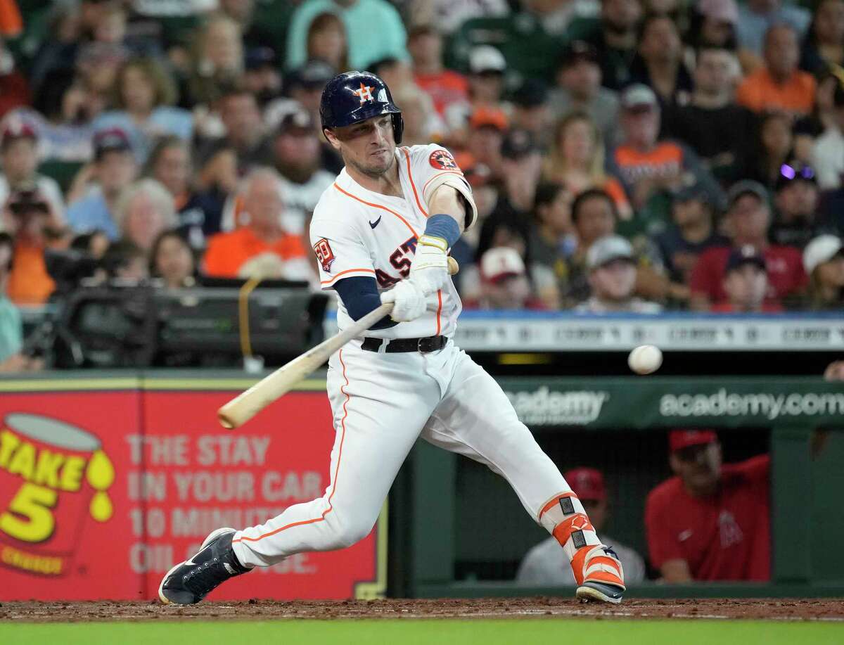 Houston Astros Alex Bregman (2) hits an RBI single off of Los Angeles Angels starting pitcher Patrick Sandoval during the second inning of an MLB game at Minute Maid Park on Saturday, July 2, 2022 in Houston.