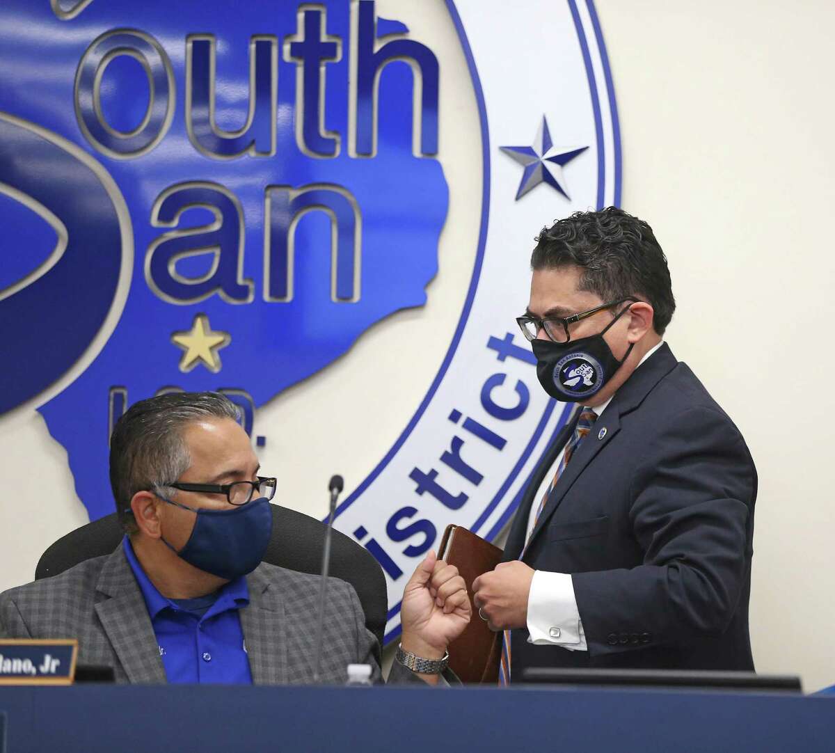 The South San Antonio Independent School District board suspended Marc Puig, right, on Dec. 4.