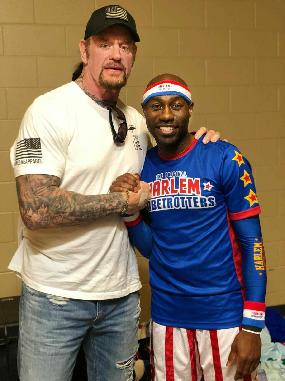 2. The only time I watch TV is on Monday and Friday (Monday Night Raw and Smackdown). I am a huge fan of WWE. One of my all-time favorite WWE superstars is The Undertaker and I got to meet him. Going to WrestleMania is at the top of my bucket list. One day.