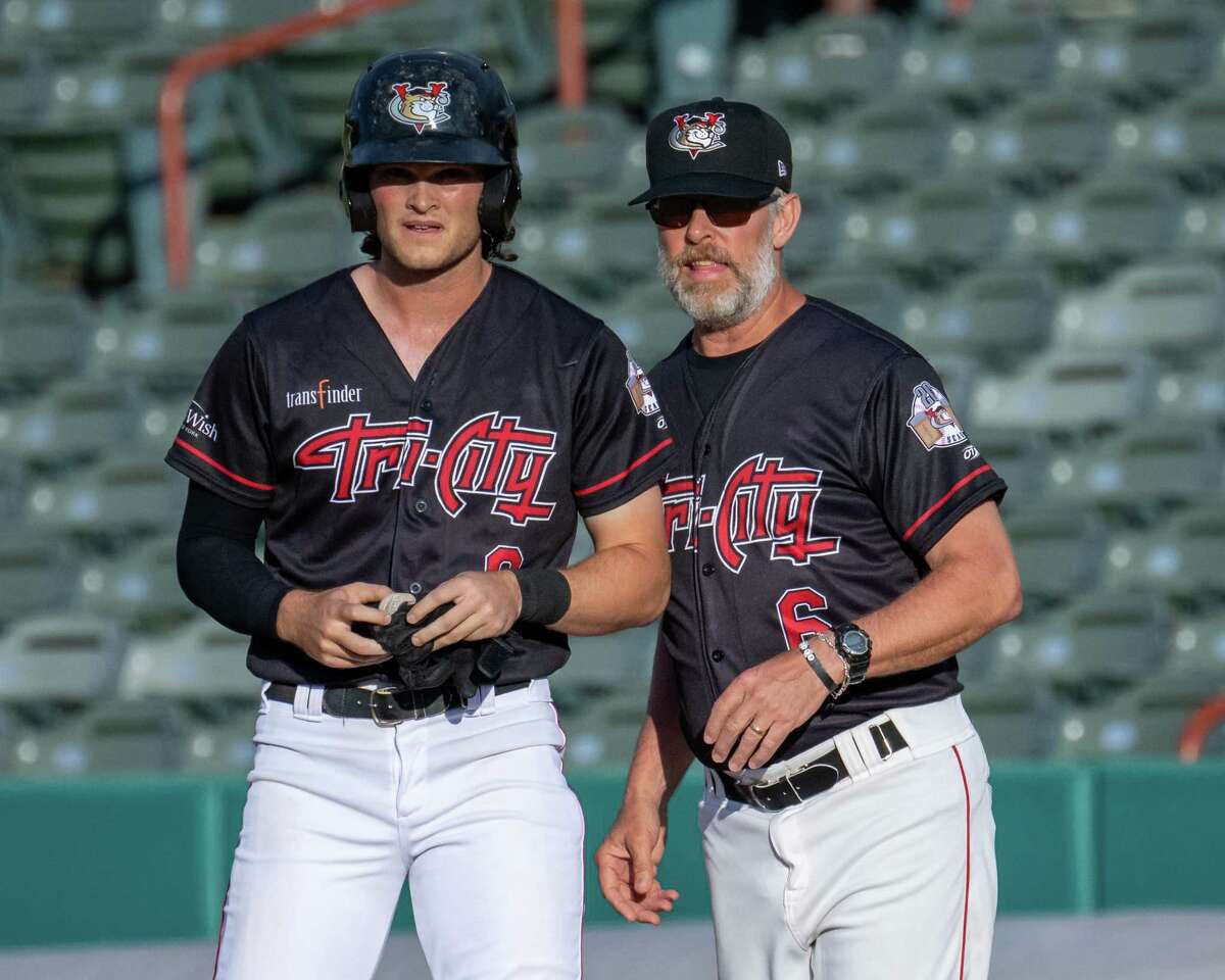 Former All-Star Jay Bell, right, plans to be with the Tri-City ValleyCats as a coach until the middle of this month. He's the father of ValleyCats player Brantley Bell, left. (Jim Franco/Special to the Times Union)