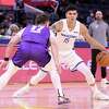 Golden State Warriors’ Gui Santos looks to drive against Sacramento Kings’ Frankie Ferrari in 2nd quarter during California Classic at Chase Center in San Francisco, Calif., on Saturday, July 2, 2022.