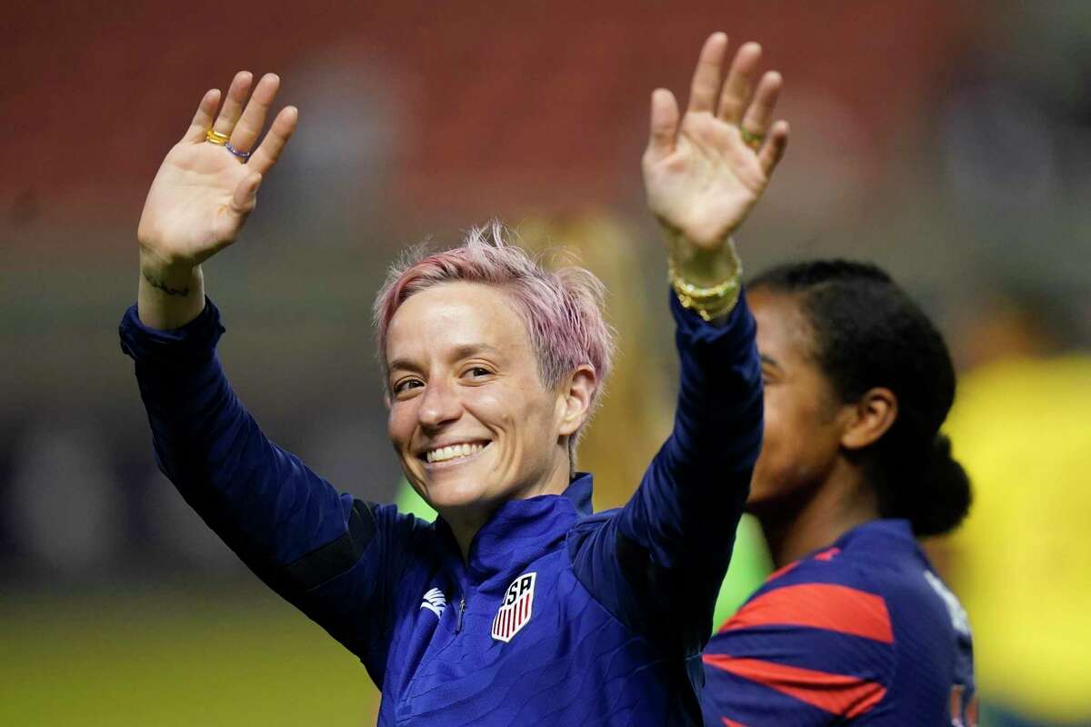 U.S. forward Megan Rapinoe waves to fans following the team's international friendly soccer match against Colombia on Tuesday, June 28, 2022, in Sandy, Utah. (AP Photo/Rick Bowmer)