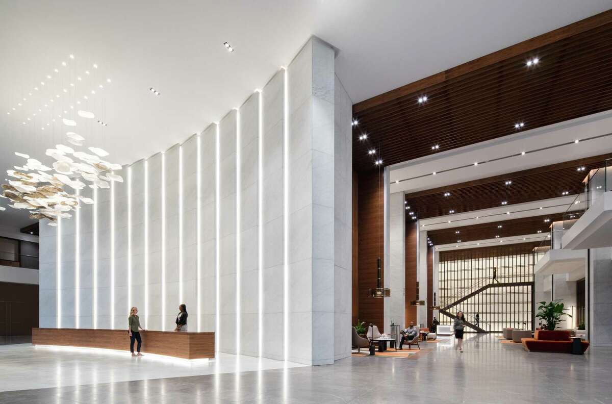 Hines has set new targets to cut is carbon emissions to net zero across its global portfolio, including several properties in Houston where it owns and manages 27.7 million square feet. Pictured is the lobby at Texas Tower, the new 47-story tower that was designed to achieve LEED Platinum certification, a marker of the building's sustainability.