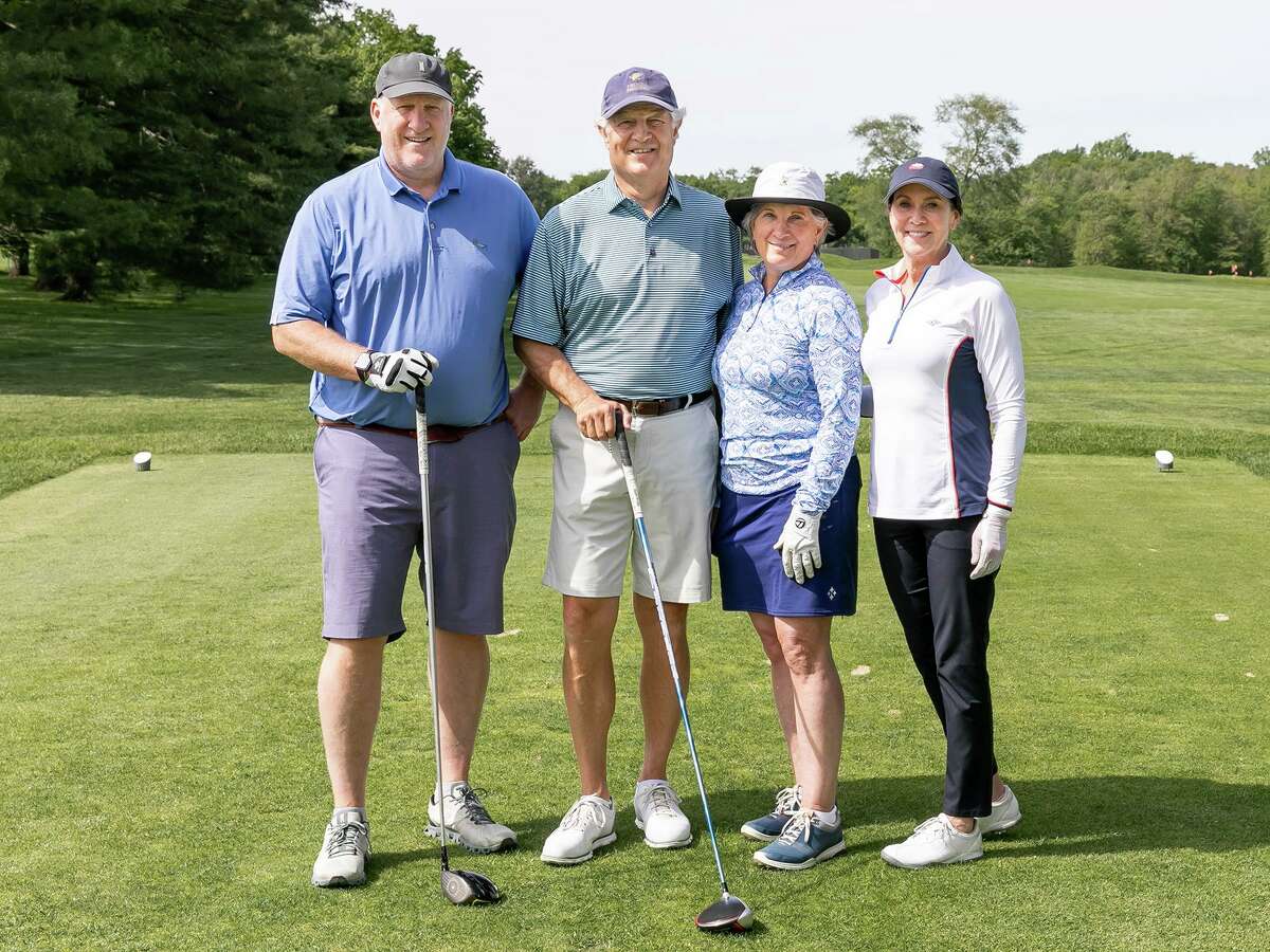 From left, Randy Simpson of Greenwich, Rob and Kathy Little of Rye Brook, N.Y., and Brooke Morell of Greenwich joined as a foursome during The Maritime Aquarium at Norwalk’s 11th annual Golf Classic on May 23 at Wee Burn Country Club in Darien. Eighty-four area professionals raised nearly $200,000 - the most ever for the event - to support the Aquarium’s living exhibits, marine science and environmental education.