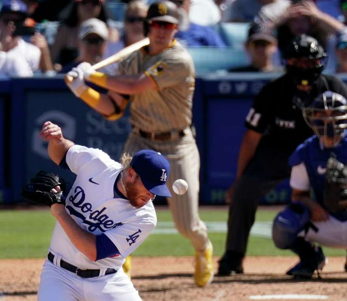 Dodgers pitcher Craig Kimbrel is hit by a liner that became a single for the Padres’ Jake Cronenworth.